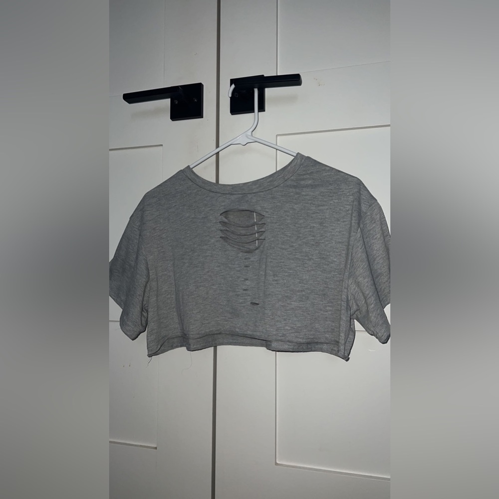 Grey crop top with styled rip